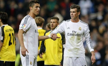 Bale and Ronaldo after Real Madrid's goal galore against Sevilla at Santiago Bernabéu