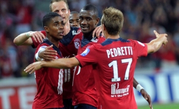 Will Lille be able to secure the third place of the table on their travel to Lorient next weekend?