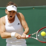 Simona Halep in action during Wimbledon 2014