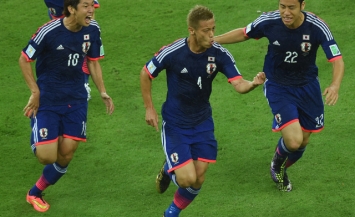 Will Honda led his team to  victory against Greece?