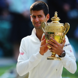 Novak Djokovic with Wimbledon 2014 trophy